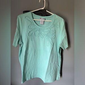 Women’s size large, light mint green, decorative, short sleeve top